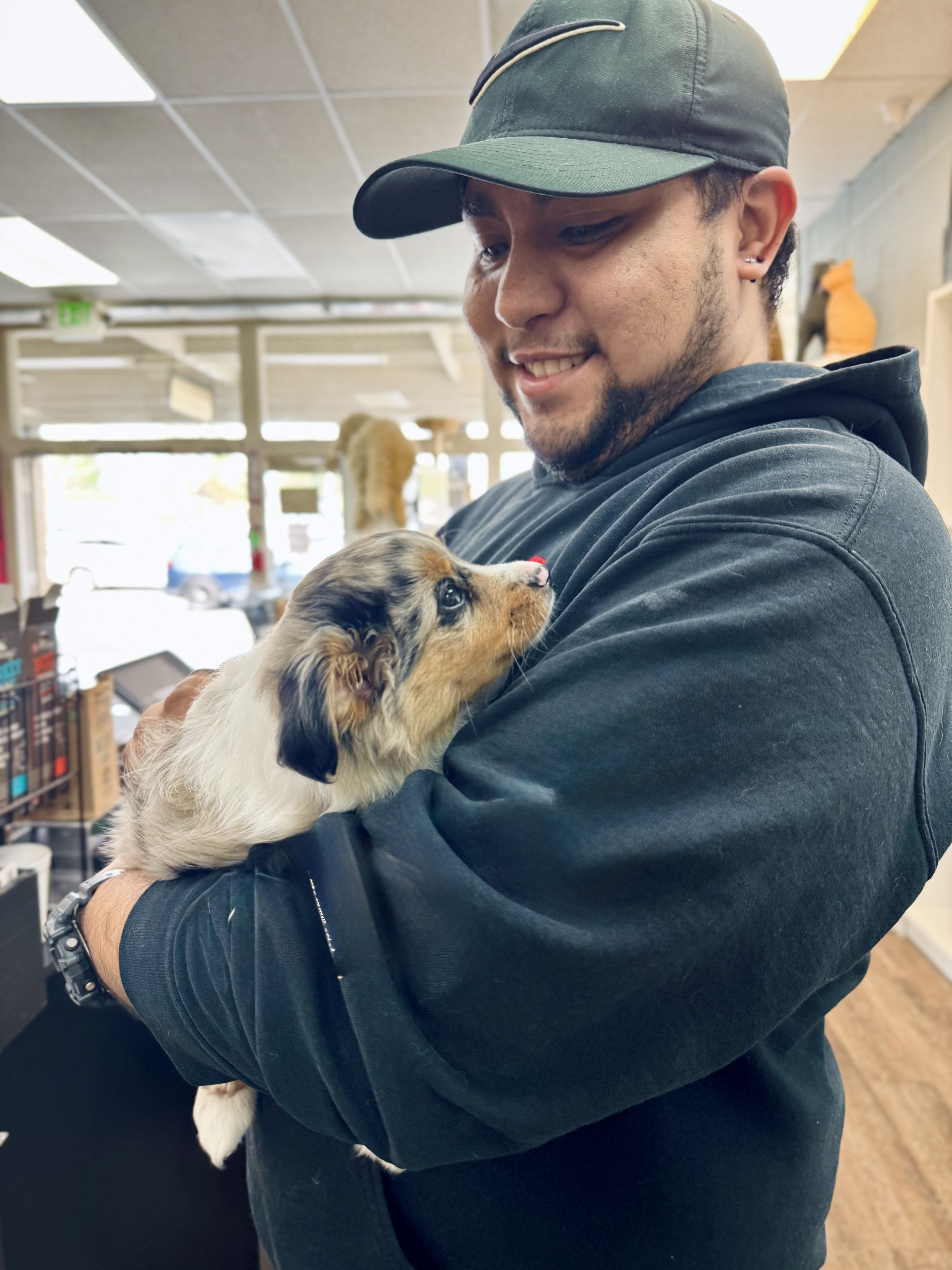Wishbone team member with puppy